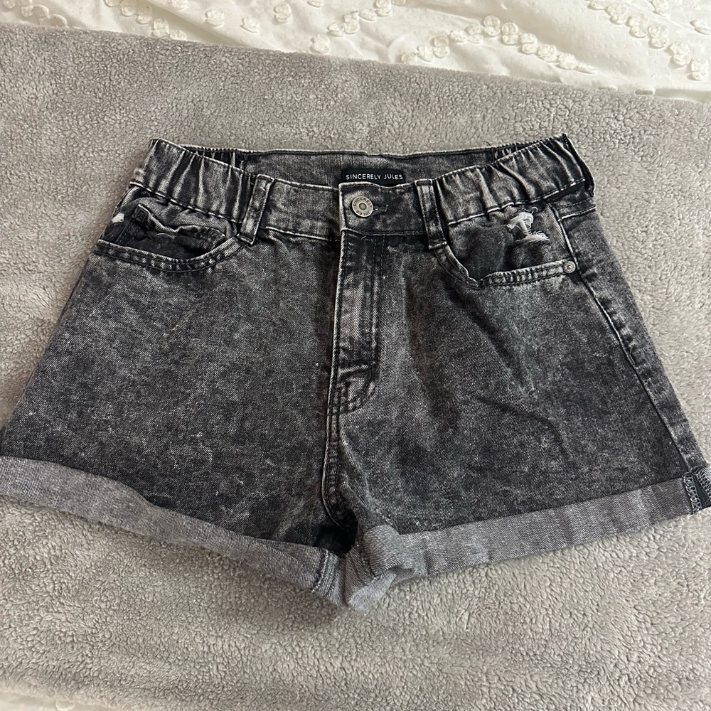 Black jean shorts.